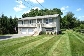 Lovingly Renovated Raised Ranch