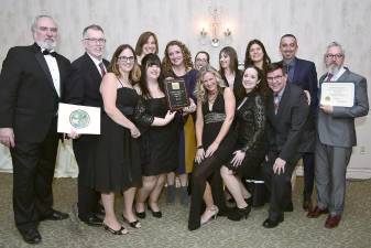 The Warwick Playground Dreams Committee received the Commitment to Community Award at the Chamber of Commerce festivities. Chamber Board President John Redman, far left, joined by Warwick Supervisor Michael Sweeton, second from left, and Warwick Mayor Newhard, far right, presented the award.