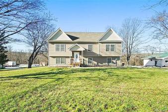 Rural elegance in almost new raised ranch bilevel