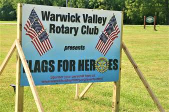 Sign advertising the Warwick Valley Rotary Club Flags for Heroes display on Route 94.