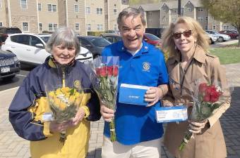 Warwick Valley Rotary Club donated roses and masks to Meals on Wheels of Warwick. Pictured from left to right are: Rotary helper Marge King-Porter, Project Coordinator/Rotary member Stan Martin and Mary Sellers, Meals on Wheels volunteer. Photos provided by Debby Briller.