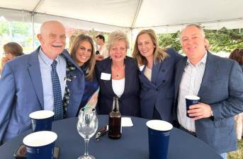 (L-R) Douglas R. Stage, Elisa Connor, Debra Dzurak, Jennifer Mele and Jeffrey D. Alario during the Stage Law Firm and Donohue, O’Connell and Riley merger on June 8, 2023.