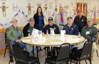 Greenwood Lake Superintendent of Schools Sarah Hadden stands with some of the members of American Legion Post 1443 who attended the breakfast. Provided photo.