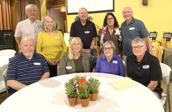 Some of the Meals on Wheels Volunteers at luncheon. Top row (L to R): John Johansen, Lynda Williford, Casey Van Duynhoven, Trish Smyth, and Walter Ross; bottom row (L to R): Bob Clemens, Kim Walsh, Karen Zaranski, and Dave Eaton.