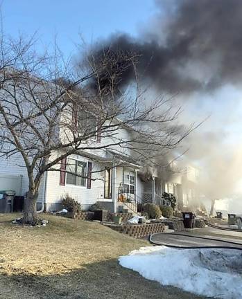 Firefighters responded Friday morning to a house fire at 60 Darin Road in the Kings Estate section of the Town of Warwick.