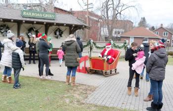 Santa arrives for another visit to Railroad Green during Home for the Holidays on Sunday, Dec. 15.