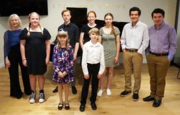 Beginning in the first row, pictured from left to right are: June Wetherelle-Toro and Wesley Lewkiewicz; and in the back row are: Ann Lewkiewicz, Cole Aronov, Lionel Wolfe (Warwick Valley High School senior), Grace Stough, Gwen Redman, Owen Durgin and Nathan Durgin (Warwick Valley High School senior). Provided photo.