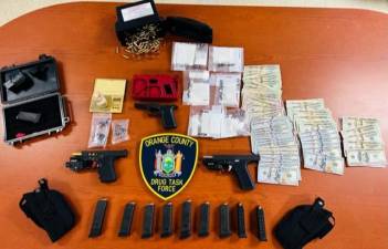 Police officers recovered two 9mm ghost guns, equipment used to assemble ghost guns, $5,190 in United States currency, as well as ammunition and scales typically used in the packaging and sale of narcotics.