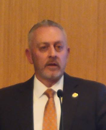 OCIDA CEO Bill Fioravante addresses crowd at meeting on brownfield remediation.