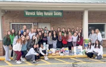 Warwick Valley Cheer teams and their donations.