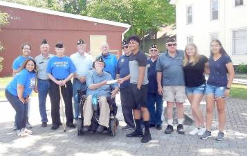 The Student Council of S.S. Seward Institute each year holds a community fund raiser to benefit American Legion Post 1240. Pictured at this year’s presentation, beginning in the first row from left to right, are: Elliana Santiago, Commander Fray Fuller and Joshua Medina; and in the second row: Josely Medina, Vincent Poloniak, William Pillmeier ,Vice Commander Thomas Fuller, James Sosler, Jack Fein, John Cutrona, John Galiski, Sophia DeJong and Camila Fuentes. The student council advisor is Miss. Katherine Hannon. Provided photos.