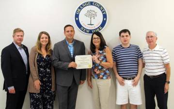 Pictured from left to right: Village of Goshen Deputy Mayor Scott Wohl, Goshen Mayor Molly O’Donnell, Orange County Executive Steven M. Neuhaus, Bonnie Mayefsky, her son, Matthew Mayefsky, and Dr. Elliot Mayefsky. Photo provided by Orange County.