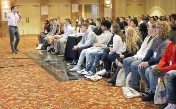 Port Jervis High School principal Andrew Marotta talks to students at the Emerging Leaders Youth Conference.