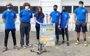 Pictured from left to right, the members of the Warwick Community Robotics Team are Thomas Magee, Aiden Woods, Kahlan Fallon, Ashok Sathiyamoorthy, Swathi Sathiyamoorthy and Ronan Patel. Provided photos.