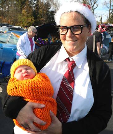 Megan McDonnell not only dressed up for the National Lampoon Christmas Vacation trunk but only 10 days ago she gave birth to her daughter Melany just in time to bring her along for Trunk or Treat.