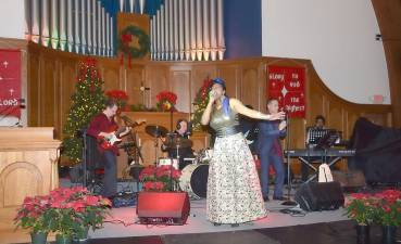 On Dec. 15, the Backpack Snack Attack Community Benefit Concert was held at the Warwick Reformed Church. The program opened with a welcome and blessing by Rev. Stacey Duensing. Introductions and thanks were given by host Joe Sclafani. Backpack founder Shirley Pruett also spoke at event. The Backpack Champion Award for 2019 was awarded to Linda Kurtz, secretary of the church. In the concert E'lissa Jones performed with Hudson Valley Ebony Strings during the first half of the evening. 3D Rhythm of Life performed during the second half. At the bottom of the program they wrote, Thank you for helping us. Changed lives by Christ's love.