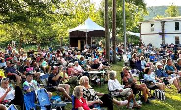 Guests enjoying entertainment at Sugar Loaf Crossing.
