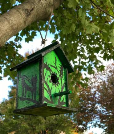 Holiday-themed birdhouses spotted in Pine Island Park