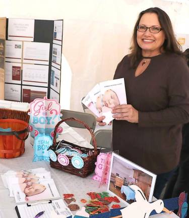 Kimberly Connelly, RN, provided information about the OB/GYN services offered.