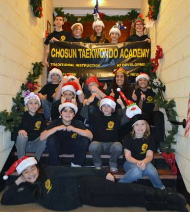 Funds raised by the Chosun Leadership Team were used to purchase dozens of toys and clothing items which were then gift-wrapped by team members and distributed to underprivileged children and their families during the annual Holiday Party held on Dec. 12 at the Warwick Reformed Church. Members of the leadership team are pictured here.