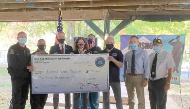 Pictured from left to right are: Greenwood Lake Mayor Jessie Dwyer,Â Assemblyman Karl Brabenec, U.S. Rep.Â Sean Patrick Maloney, N.Y.S.Â Senator Jen Metzger, Rumshock Veterans Foundation Board President Bill Whetsel, Rumshock Veterans Foundation Board VP Frank Messina, Orange County Veterans Services Agency Director Christian Farrell, and Commander Tom Mulcahy of the Greenwood Lake American Legion Arthur Finnegan Post 1443. Provided photo.