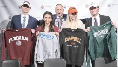 Warwick Valley High School student-athletes (l-r) Jesse Abramson, Julia Singh, Shelby Spencer, and Drew Borner with Superintendent David Leach during a Letter of Intent signing ceremony on Feb. 8, 2023.