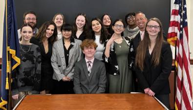 Seward's Mock Trial team. Standing back row, left to right: Adviser Dom Pascullo Jaycee Matuszewski, Virginia Clark, Jackie Tomassi and Tahnia-Marie Rucker; standing front row, from left: Kaci Werner, legal adviser Brittany Kessler, Lupita Velazquez-Trinidad, Amy Hernandez-Chinchilla, Autumn Montanez, legal adviser Richard Moran and Violet Collins; and sitting: Keegan McGoldrick. Photo provided by the Florida School District.