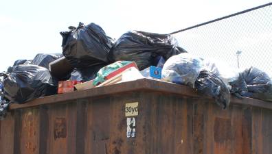 Unconcealed dumpsters mess with the image the Village of Goshen seeks to foster.