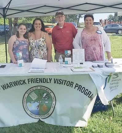 Picture from left to right at the Warwick Senior Picnic earlier this month are: Lianna Bacenet, Lisa Bacenet, coordinator of the Friendly Visitor Program, Warwick Town Supervisor Michael Sweeton and Paula Blumenau, outreach coordinator for Jewish Family Services. Provided photo.