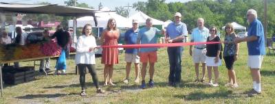 On Tuesday, June 29, the Florida Farmers Market opened for the 2021 season with a ceremonial ribbon cutting. The market, located on Route 17A/North Main Street, is open every Tuesday from 10 am. to 4 p.m. now through the end of October. Pictured from left to right at the opening ceremony are: Janet Picarelli, treasurer of the Florida Chamber of Commerce and vendor; Alyssa Jahrling, village trustee; Robert Scott, vice president of the Florida Chamber; Enrique Gerena, market manager, Mayor Daniel Harter Jr.; Jack Benson; Donna Benson; Mary Coleman; and Jan Jansen, president of the Florida Chamber of Commerce. For more information about the market, visit www.floridafarmersmarket.org. Photo provided by Beth Fuller.
