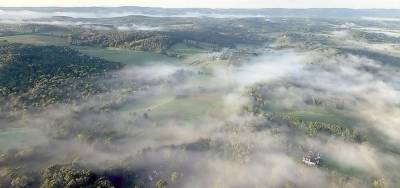 Mark Silvestri is a private helicopter pilot from Warwick. On Tuesday, Aug. 18, he went for an early morning flight over Warwick and captured these images, showing the low fog in the valley after a storm the previous night. Flying about 600 feet above ground level in a Robinson R44ii helicopter, Silvestri used his iPhone to capture a series of photos of areas mostly near Jessup Road near Florida, heading southwest, through an area near Union Corners Road. Mt. Eve peeks up out of the fog in a few shots. “It was,” Silvestri noted, “a beautiful morning. Thought you might enjoy.”