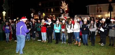 The ceremony began with traditional Christmas carols sung by members of the Warwick Valley High School Treble Choir and Meistersingers directed by Anthony Roca. Photos by Roger Gavan.