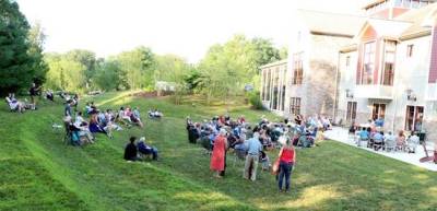On Saturday evening, July 27, more than 100 guests, enjoying a gentle breeze on the hill and patio behind the Albert Wisner Public Libray, heard 30 Warwick locals share their short story of hometown moments past.
