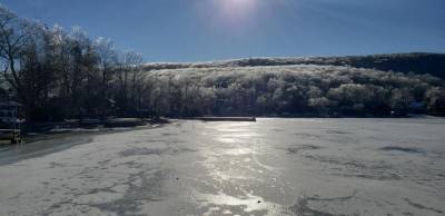 Mother Nature glazes the lake, serving adventurers, saving greenery