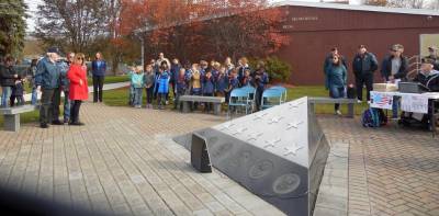 The Pledge of Allegiance during Veterans Day ceremonies in the Village of Florida were led by Cubs Scouts, Boy Scouts and Girl Scouts. Photos presented by Beth Fuller, president of the Ladies Auxiliary of the Florida American Legion Unit 1250.