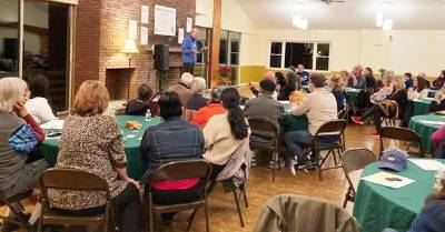 A story-teller tells his story to an appreciative audience.