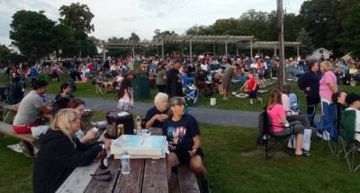 A large crowd brought lawn chairs and some had picnics while enjoying the band. Photos by Ed Bailey.