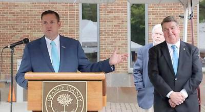 Orange County Executive Steven M. Neuhaus speaks at the 2021 Orange County Law Enforcement Memorial Service on Friday, May 7, at the Orange County Courthouse. To his right is Mike McGinn, president of the Fraternal Order of Police, Jason Conklin Memorial Lodge #957. He also is a member of the Monroe Town Board. Photo provided by Orange County.