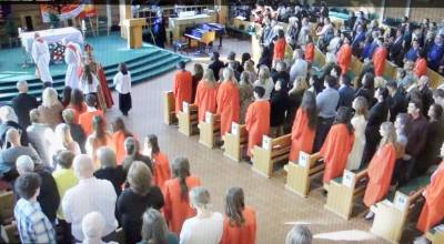 All of the candidates, about to be confirmed, stand.