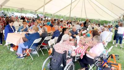 Last year, approximately 500 seniors enjoyed near perfect weather with temperatures in the low 70s, great food, music and good company at the annual Senior Barbecue in Warwick. It will be held Aug. 24 this year. File photo by Roger Gavan.