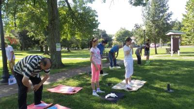 Falun Dafa practitioners in Goshen perform specific exercises as a means to achieving spiritual perfection.