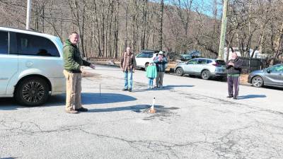 RK1 NASA ambassador Jim Hall fires up a toy rocket using a mixture of vinegar and baking soda Saturday, Feb. 24 outside the Greenwood Lake Elks Lodge. It lifted about an inch off the ground. (Photo by Kathy Shwiff)