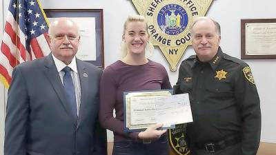 From left: SUNY Orange Department Chair Dennis O'Loughlin, Elizabeth Kimber, and Sheriff Carl E. DuBois