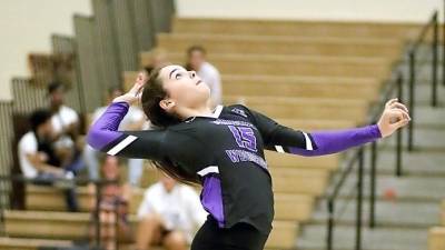 Monroe-Woodbury Varsity Volleyball player Jordan Ader unleashes one of her ferocious serves during a non-league match a year ago against the Wallkill High School Panthers. The fall volleyball season, like the seasons for football and competitive cheer leading, has been postponed until March 1, 2021, to address membership concerns associated with high-risk fall sports. File photo by William Dimmit.