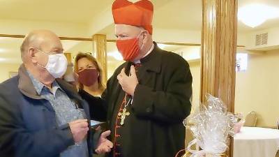 On Holy Saturday, April 3, Cardinal Timothy Dolan, archbishop of New York, joined by Pastor Bernard Heterto, blessed baskets of food brought by members of the Mission of St. Stanislaus in Pine Island.