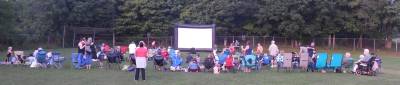 Young and old alike brought lawn chairs and blankets to watch ‘Hotel Transylvania 3” on the great lawn at S.S. Seward Institute in Florida for “Movie in the Village” night on Aug. 21.