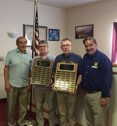 Photo by Rosemarie BastanzaWarwick Rotarians are seeking nominations for Warwick&#x2019;s 2017-2018 Citizen of the Year. Committee members include, left to right: Co-chair Leo Kaytes Sr.; Rotary President David Eaton, holding the Rotary plaque listing recent winners; Master of Ceremonies Michael Sweeton with the Jaycee plaque honoring winners from 1968-1999; and Co-chair Stan Martin. The Warwick Citizens of the Year plaques are displayed at Town Hall.