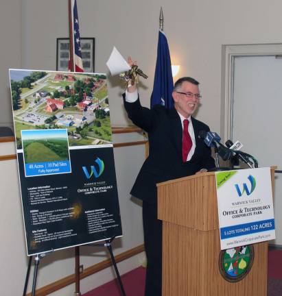 In a symbolic gesture, Town of Warwick Supervisor Michael Sweeton raised a handful of keys. He had just made the announcement at a press conference held Thursday, March 6, that on the previous day the State of New York had finally approved the transfer of the 730 acre property at the former Mid-Orange Correctional Facility to the Warwick Valley Local Development Corporation (LDC) and the Town of Warwick.
