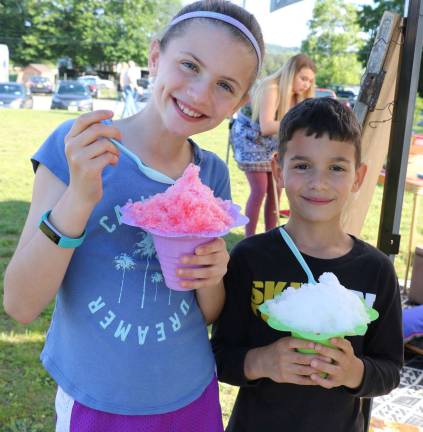 A nice treat on a warm day for Summer Adams, 9, and her brother Grant, 7.