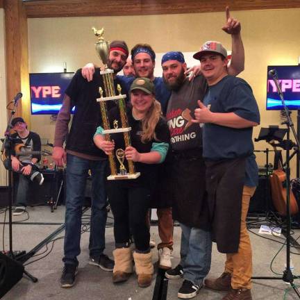 The Wing Wars champions: The crew from Sweet Onion Brewhouse celebrate this victory last weekend at the Wing Wars competition sponsored by radio station WPDH: In front, holding the trophy is Kristen Mayer; and standing behind her, from left to right are: Jared Mayer, Tommy Cosgrove, Jason Mcloughlin and Brendan Doyle.